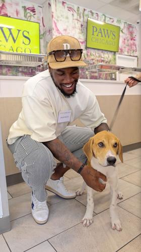 Jacob Martin with PAWS pup Stark.