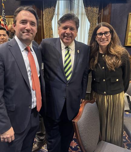 Kris and Liz Lombardo Stark with Governor Pritzker.