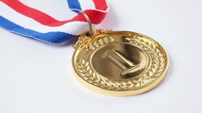 USA wins historic Olympic hockey gold with overtime victory over Canada. (Shutterstock.com photo #633913676, by Luca Santilli)