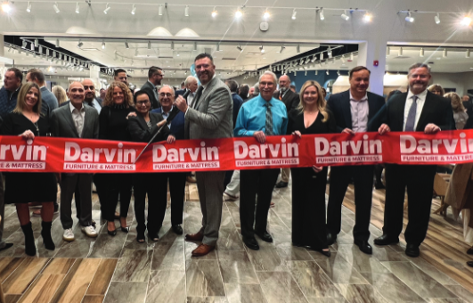 Darvin President Will Harris and VIPs cut the ribbon to celebrate the grand opening of The Marketplace, a new expansion in its Orland Park showroom.