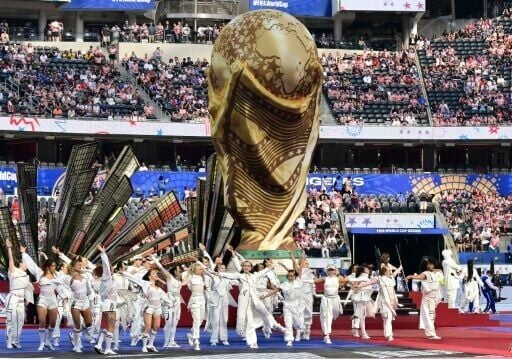 Celebrities including Halle Berry, Rob Lowe and Paris Hilton watched on as performers danced around a giant World Cup trophy