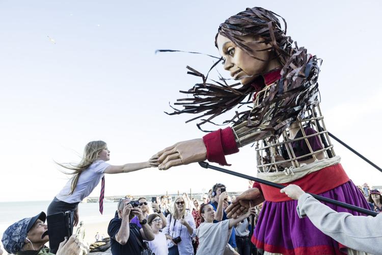 Chicago Shakespeare Theater welcomes The Walk with Little Amal, the internationally celebrated 12‑foot‑tall puppet of a 10‑year‑old girl, as part of her epic 6,000‑mile journey across the U.S. | Photo by Igor Emmerich, courtesy of Chicago Shakespeare Th...