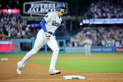 Freddie Freeman of the Los Angeles Dodgers rounds the bases after hitting a home run in the Dodgers' victory over the New York Yankees in game two of the World Series