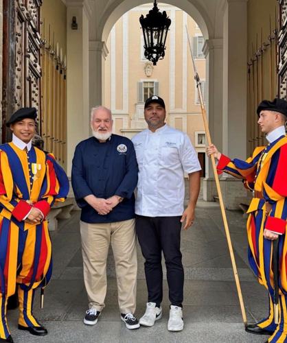 Chef Art Smith and his Executive Chef Hector Guerrero with Pope Leo's Swiss guards.