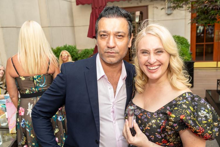 Makeup guru Claudio Riaz with a glam fan.