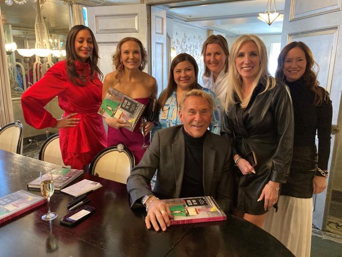 Fashion and style expert Hal Rubenstein surrounded by adoring fans at Costume Council event/book signing at the Women's Athletic Club. (Photo | Candace Jordan)