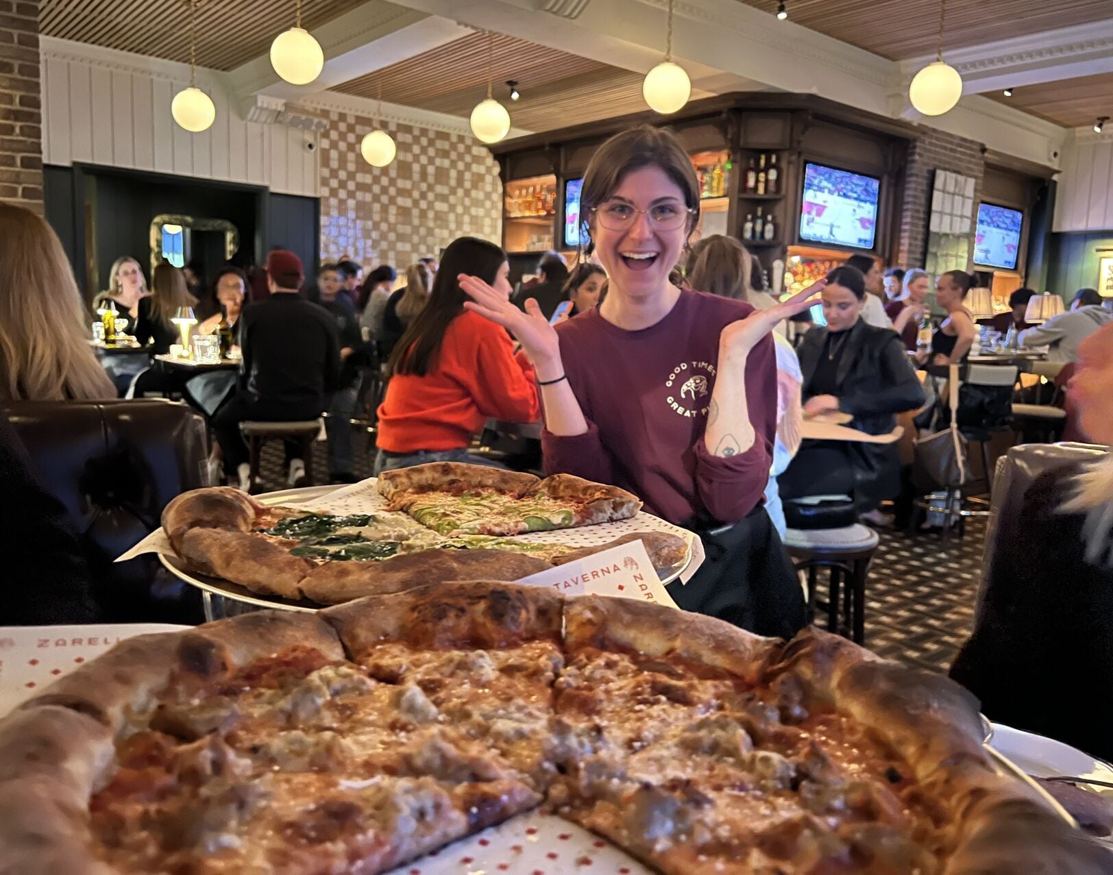 Our server Evann Meiers is almost more excited about our pizza than we are!
