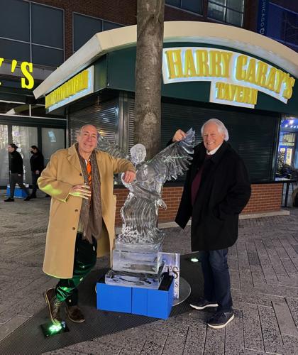Jamie Gabala andJamie Gabala and Chuck Jordan stand beside replica ice sculpture as seen in film. (Photo by Candace Jordan)