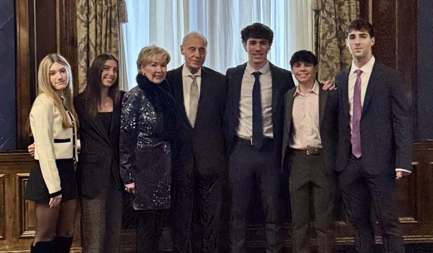 Peggy and Steve Lombardo with grandkids.