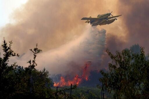Dozens of aircraft are flying fire-dousing missions over the blazes in Spain