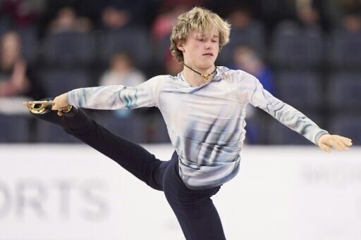 Reigning world champion Ilia Malinin of the United States won the men's short program at Skate Canada