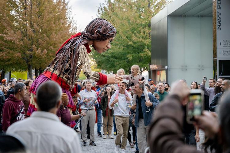 Chicago Shakespeare Theater welcomed 'The Walk with Little Amal,' the internationally celebrated 12-foot-tall puppet of a 10-year-old girl, as part of her epic 6,000-mile journey across the United States this fall. (Photo by Ty.Optix Photography)