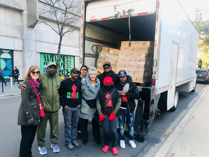Pastor Harrell, BMU and Cook County Treasurer Maria Pappas, during a furniture and appliance giveaway in Chicago.