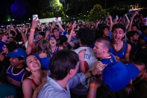 Knicks fans celebrate in Central Park after the New York Knicks beat the San Antonio Spurs to win the NBA title