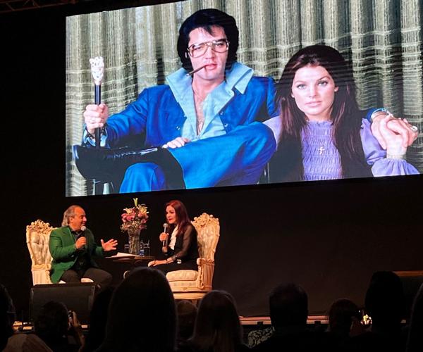 Priscilla Presley onstage at the DesPlaines Theatre with moderator/owner Ron Onesti.