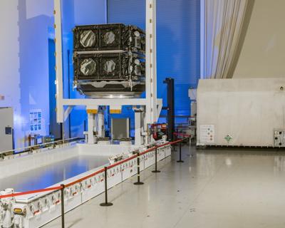 O3b mPOWER F9 and F10 stacked and being prepared for shipment. (Boeing photo by Jesus Carreno)