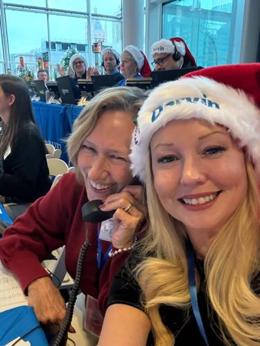 Barb Harrington, Darvin Advertising Director, and Charlie Ann Dwyer, Darvin Business Development Manager, taking phone calls at Radiothon.