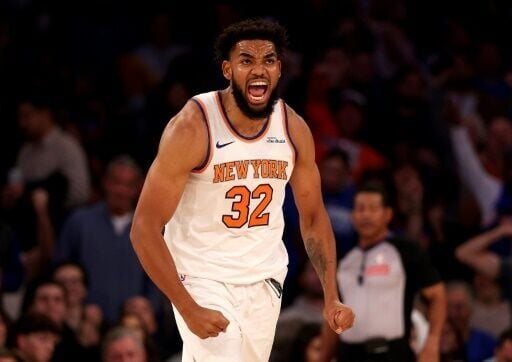 Karl-Anthony Towns of the New York Knicks reacts after a dunk in the first quarter of an NBA victory over the Indiana Pacers
