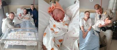 Photo: Freeway miracle as officers assist in roadside birth