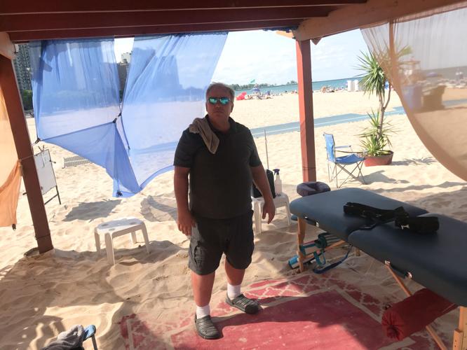 “Bruce the Masseuse”- Long time Oak Street Beach icon is still going strong 2