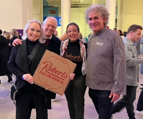 Author Candid Candace with the team from Robert's Pizza and Dough Company.