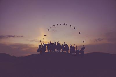 Some dangling participles from a 50th high school reunion