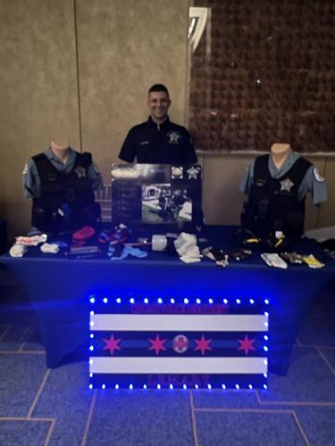 Chicago Police Officers greeting attendees at the True Blue Event at the Hyatt Regency November 5.