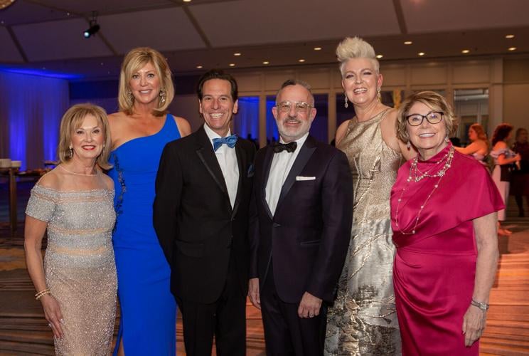 Joan Clifford, Diane Landgren, Neal Zucker, Gary Metzner, Heather Zimmerman and WB president Fran Del Boca.