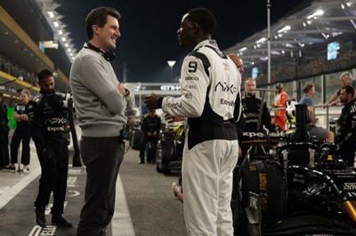 Director Joe Kosinski and star Damson Idris on the set of Apple Original Films’ “F1” at the Yas marina Circuit, home of the Abu Dhabi Grand Prix (Photo courtesy of Apple)