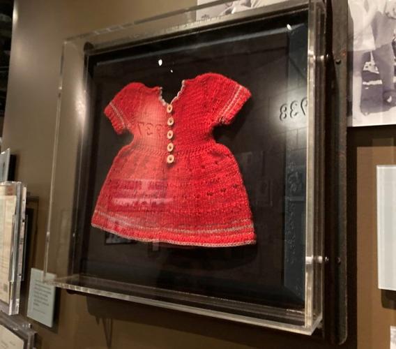 This red sweater belonged to a toddler who escaped the Holocaust because her family fled to Shanghai.