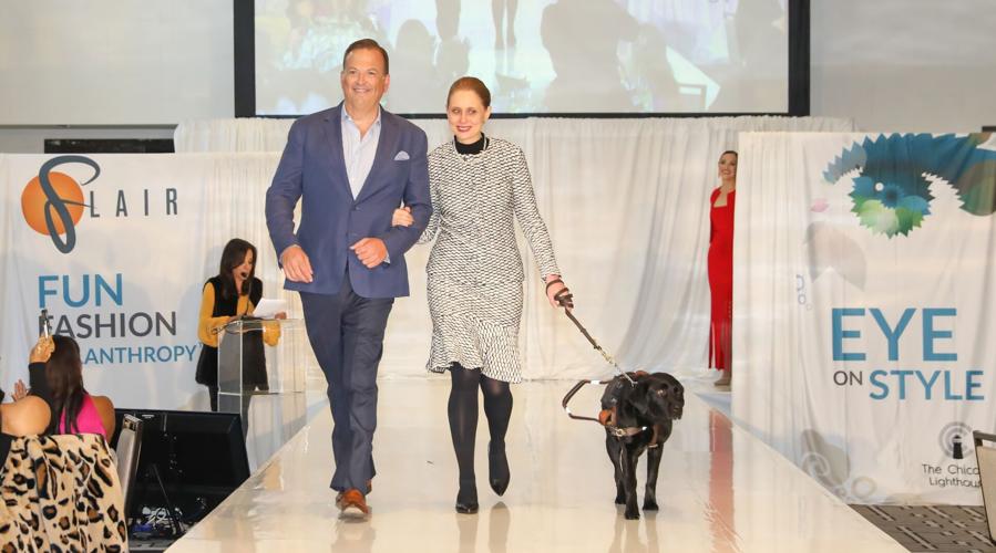 FLAIR 2022 - On the runway, Paul Iacono with Chicago Lighthouse model and her guide dog.  (Photo by Mila Samokhina)