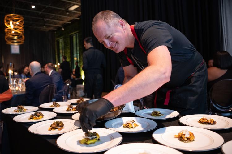 Chefs prepare dishes in front of the guests for a unique dining experience _ Photo via Abel Arciniega Tequila Graphics