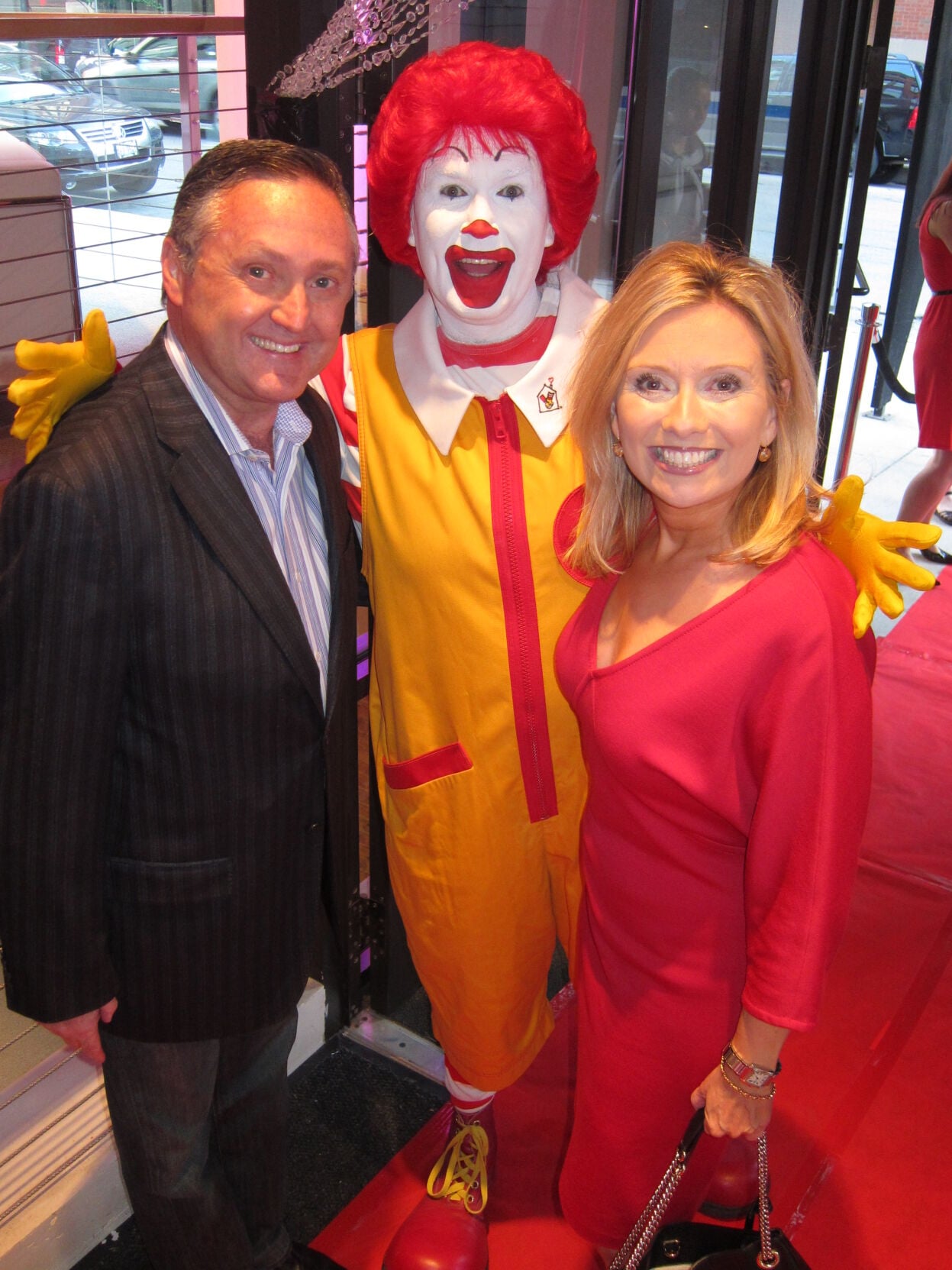 Macy's Glamorama fashion show benefited Ronald McDonald House Charities for years. Ronald McDonald shown here with Macy's VP Andrea Schwartz Stryker and Dr. Steve Stryker. (Photo by Candace Jordan)