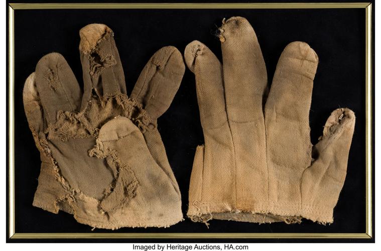 "Wizard of Oz"/ Bert Lahr's Cowardly Lion gloves sold for $20,625. (Photo courtesy of Heritage Auctions)