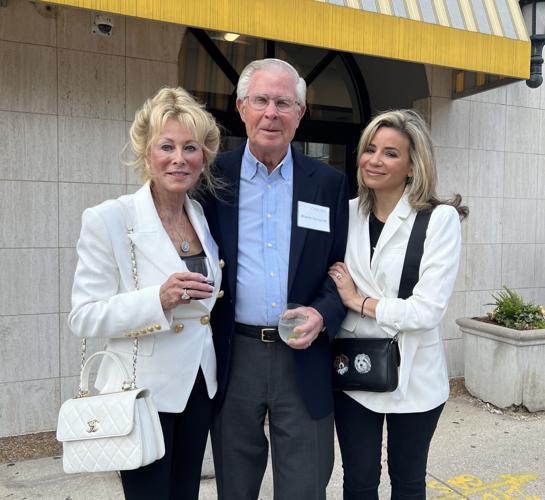 Nan and Wayne Kocourek with Susanna Wickham, PAWS Chicago's CEO, in front of the medical center that now bears their name. (Photo Candace Jordan)