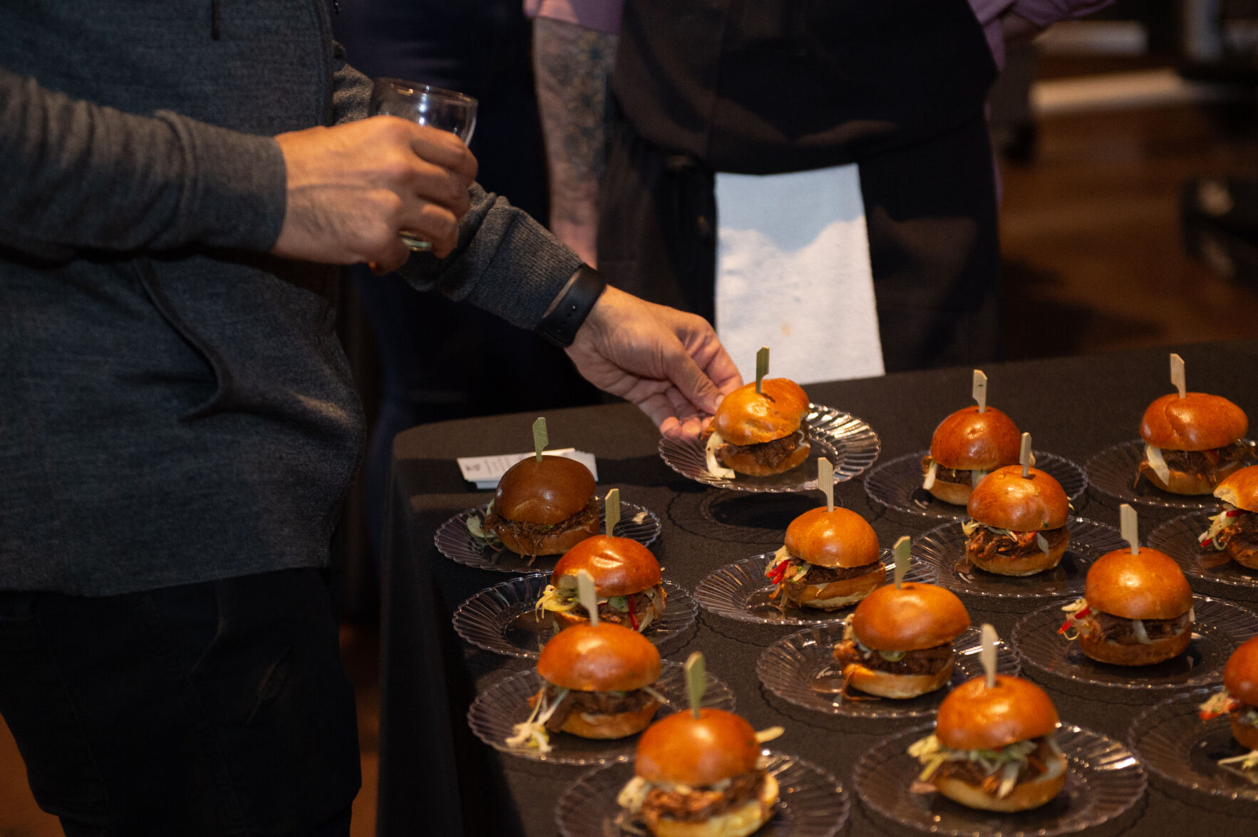 guests try delicious bites provided by local restaurants at chicago on tap.jpg