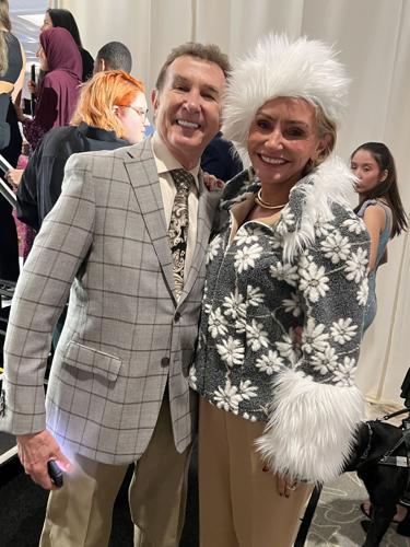 Designer Al Menotti with Kristine Kinder wearing his designs. (Candace Jordan photo)