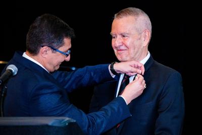 Michael Kutza receiving the Order of Merit of the Italian Republic for his contributions to Italian film on 6/1/2017. (Photo by Timothy M. Schmidt)