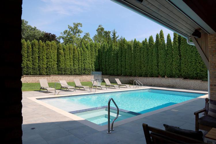 Pool area of former Blackhawk Adrian Aucoin's Hinsdale home that is listed for $6M. (photo | Redfin)