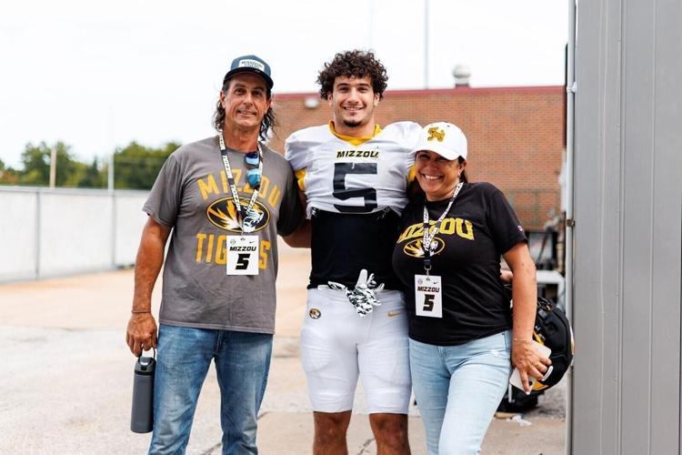 Nick Rodriguez and his parents