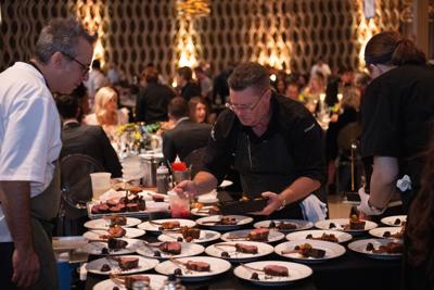 Chefs prepare a six course meal for guests _ Photo via Abel Arciniega Tequila Graphics
