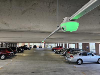 The Park Assist Solution, an Automated Parking Guidance System (APGS), installed in a parking garage, boosting safety and security.