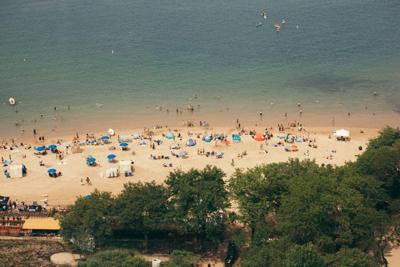 Break out the bathing suits! Chicago beaches open Friday for the summer season