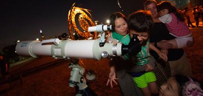 Families gather at the Adler Planetarium for a look at the stars