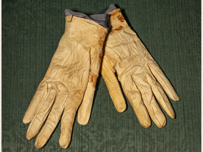 A pair of blood-stained white kid-leather gloves carried by President Abraham Lincoln at Ford's Theatre the night of his assassination, April 14, 1865.