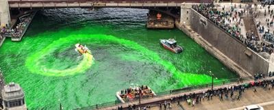 Volunteers green the Chicago River in an annual St. Patrick’s Day tradition. Photo courtesy Amy Ulivieri