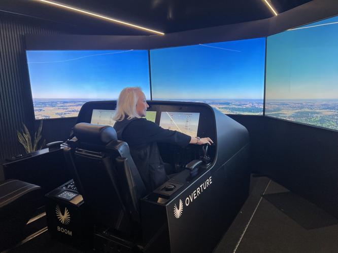 Inside the Boom Supersonic flight simulator, where visitors can climb into a full-scale flight deck and try their hand at landing a supersonic aircraft. (Elaine Hyde photo)