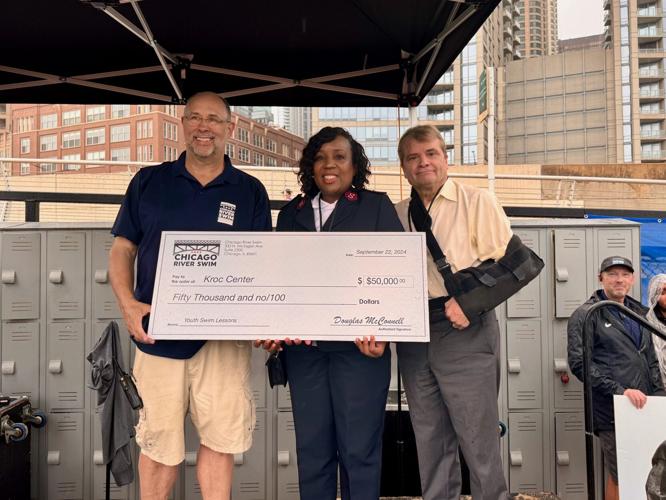 Doug McConnell,  Lt. Debela and Congressman Mike Quigley. (Photo courtesy of Chicago River Swim)
