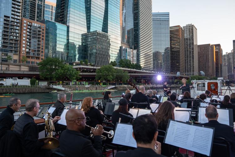 Trial run for Music of the Baroque's upcoming historic The Chicago Water Music performance conducted by Dame Jane Glover on the Chicago River. (Photo courtesy of Music of the Baroque by Elliot Mandel)