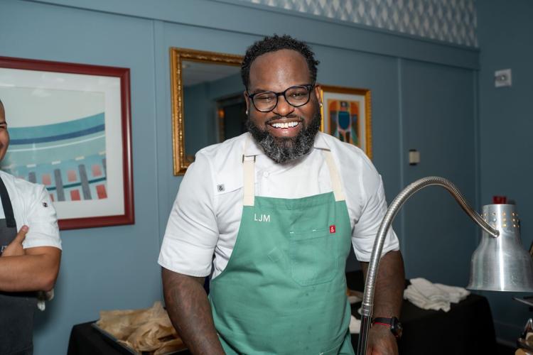 Chef Lamar Moore, of Bronzeville Winery, prepares his famous beef brisket. | NinaPalazzolo@vitadi.nina b
